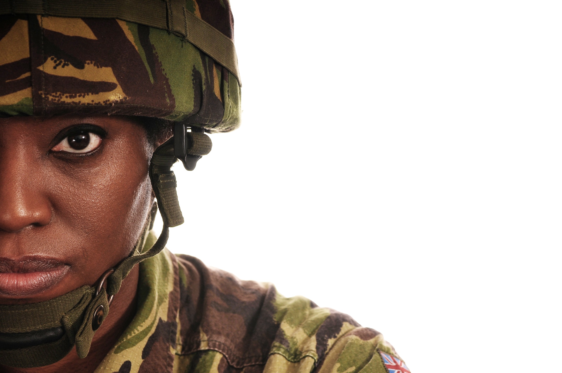 Female Soldier shown half face.Photo by John Gomez on Shutterstock